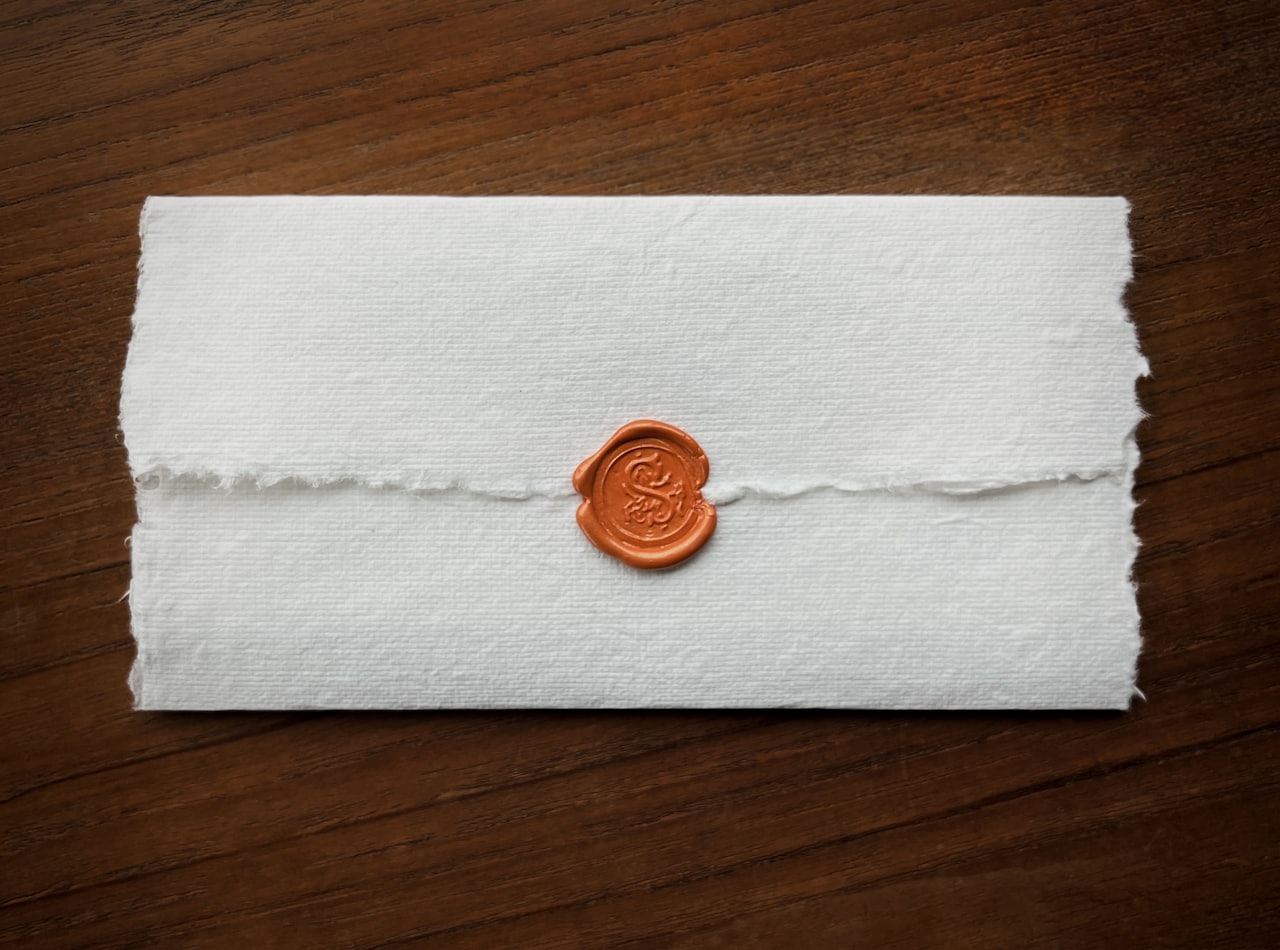 A wax seal pressed onto a paper document